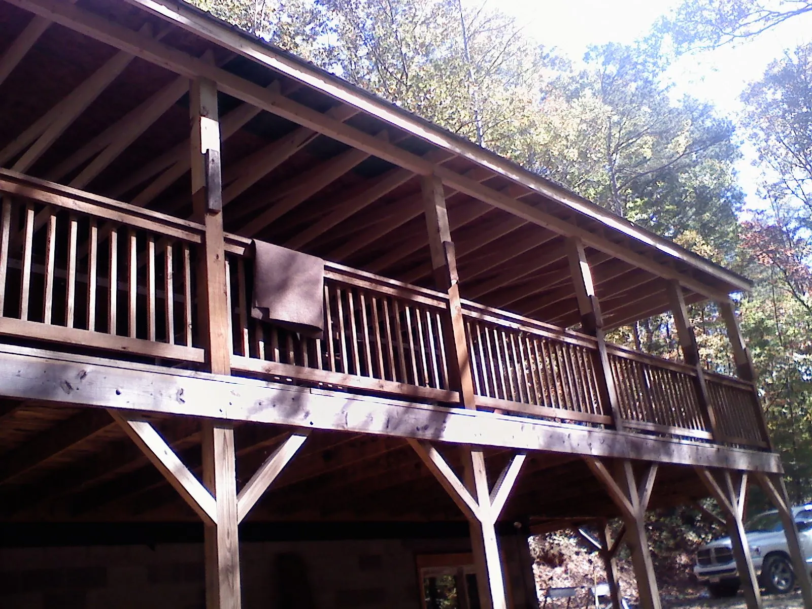 Timber framing under a new elevated porch and deck — Roof Leak Repair in Bennington by Roofing Brothers